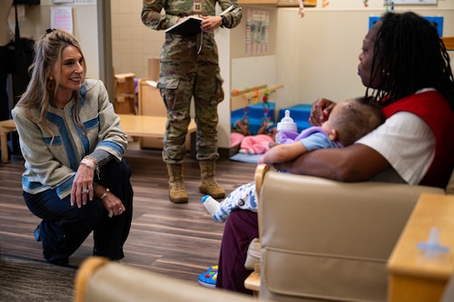 Ms. Cindy Wilsbach, wife of U.S. Air Force Chief of Staff Gen. Ken Wilsbach, speaks with a Child Development Center education technician about the CDC program during a tour at Barksdale Air Force Base, Louisiana, Nov. 19, 2025. Ms. Wilsbach saw the impact that the base CDC has on the bomber community, providing care to Barksdale’s families. (U.S. Air Force photo by Airman 1st Class Jaiyah Lewis)