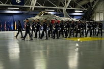 Members of the U.S. Air Force Honor Guard march across the hangar during a rehearsal for Gen. Ken Wislbach’s assumption of responsibility as the 24th Chief of Staff of the Air Force at Joint Base Andrews, Md., Nov. 18, 2025.