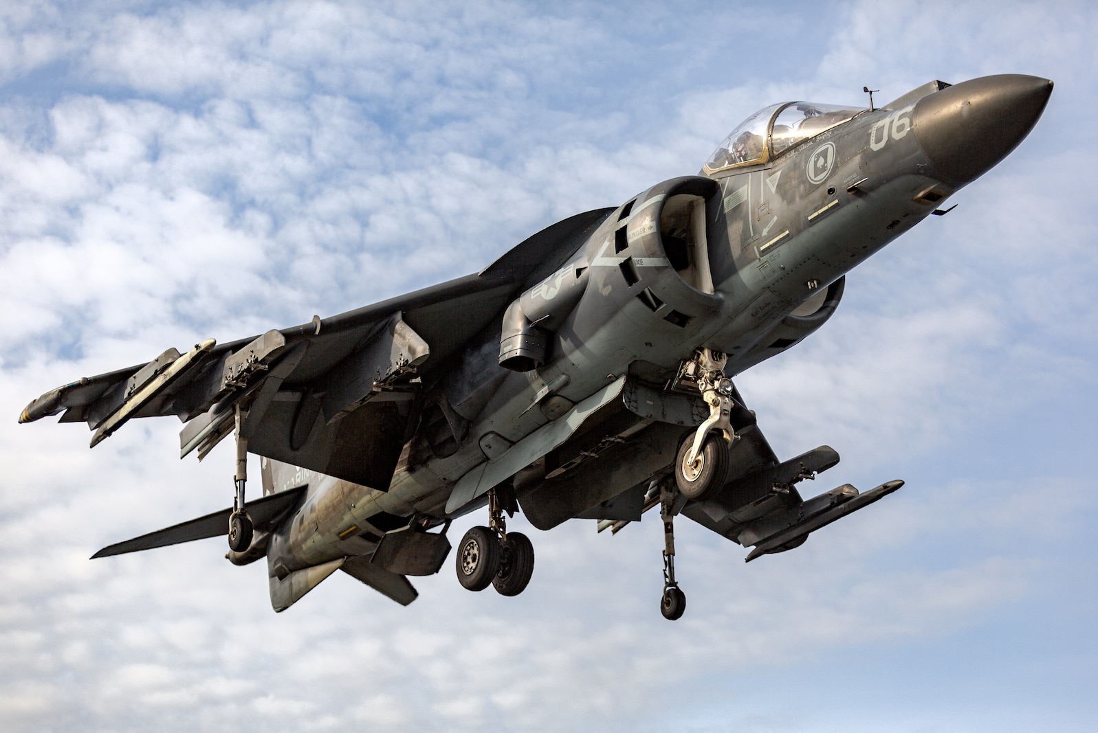 U.S. Marine Corps Capt. Ryan Gettinger, an AV-8B Harrier II jet pilot with Marine Attack Squadron (VMA) 231, vertically lands an AV-8B Harrier II jet on the flight deck aboard the amphibious assault ship USS Kearsarge (LHD 3), Dec. 4, 2022. VMA-231 trained with U.S. Sailors to strengthen interoperability and conduct carrier qualifications prior to their upcoming deployment with the 26th Marine Expeditionary Unit. VMA-231 is a subordinate unit of 2nd Marine Aircraft Wing, the aviation combat element of II Marine Expeditionary Force. (U.S. Marine Corps photo by Cpl. Christian Cortez)