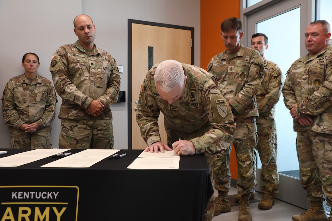 The signed commitments set on the table during the Recruiting and Retention Battalion’s signing of mission commitments for FY26 at Joint Force Headquarters, Sept. 30, 2025