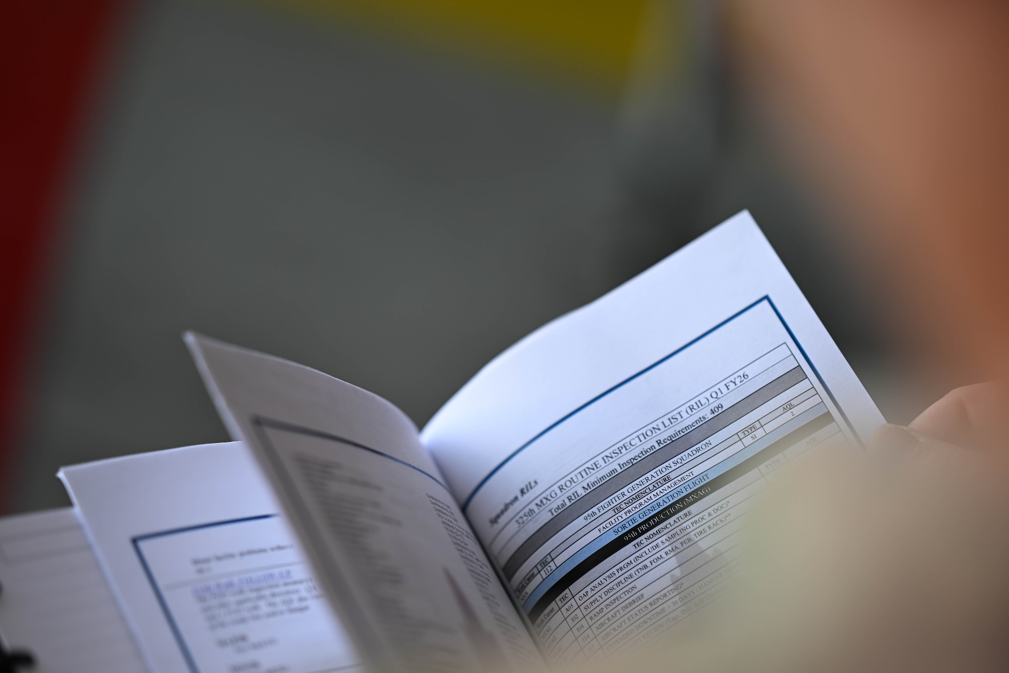 Airman looks at paperwork
