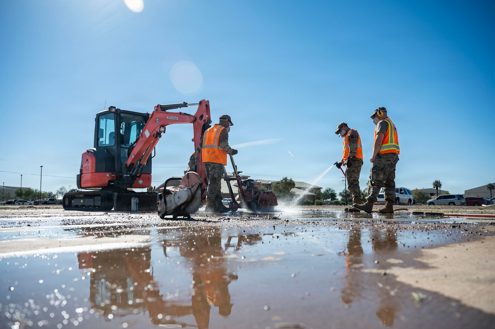 U.S. Air Force Airmen worked to excavate and repair a runway during Mosaic Lightning 26-1 at Davis-Monthan Air Force Base, Arizona, Nov. 12, 2025. The Airmen worked together to conduct a repair on the simulated flightline, demonstrating their teamwork and efficiency in completing the task in a short amount of time. (U.S. Air Force photo by Airman 1st Class Samantha Melecio)