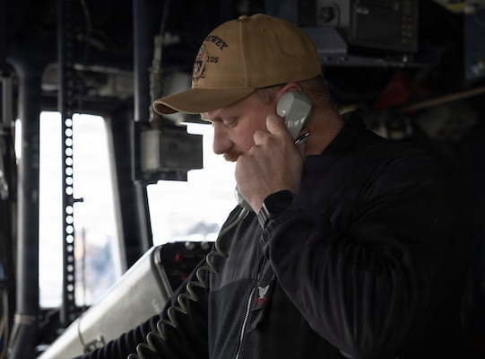 U.S. Navy Quartermaster 2nd Class Tyler Northern stands watch aboard Arleigh Burke-class guided-missile destroyer USS Dewey (DDG 105) during the Maritime Counter Special Operations Exercise (MCSOFEX) with the Republic of Korea (ROK) Navy, Nov. 18, 2025.