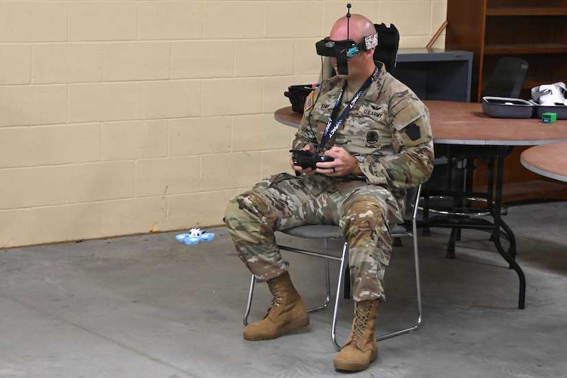 Chief Warrant Officer 2 Nathan Shea, the Unmanned Aircraft Systems operations officer at the Fort Indiantown Gap UAS facility, operates a first-person-view, or FPV, drone on Sept. 2, 2025, at Fort Indiantown Gap, Pennsylvania. (Pennsylvania National Guard photo by Brad Rhen)