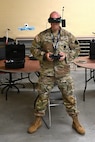 Chief Warrant Officer 2 Nathan Shea, the Unmanned Aircraft Systems operations officer at the Fort Indiantown Gap UAS facility, operates a first-person-view, or FPV, drone on Sept. 2, 2025, at Fort Indiantown Gap, Pennsylvania. (Pennsylvania National Guard photo by Brad Rhen)