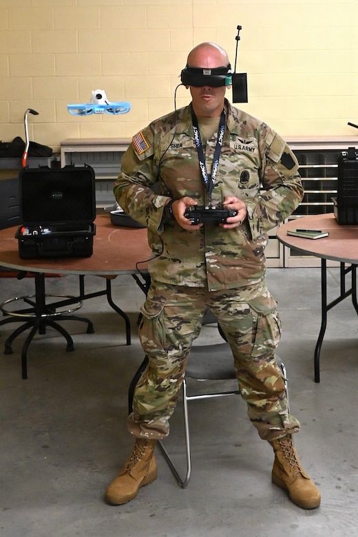 Chief Warrant Officer 2 Nathan Shea, the Unmanned Aircraft Systems operations officer at the Fort Indiantown Gap UAS facility, operates a first-person-view, or FPV, drone on Sept. 2, 2025, at Fort Indiantown Gap, Pennsylvania. (Pennsylvania National Guard photo by Brad Rhen)