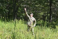 An instructor from the 166th Regiment - Regional Training Institute catches an unmanned aircraft system on Sept. 4, 2025, at Fort Indiantown Gap, Pennsylvania. (Pennsylvania National Guard photo by Brad Rhen)