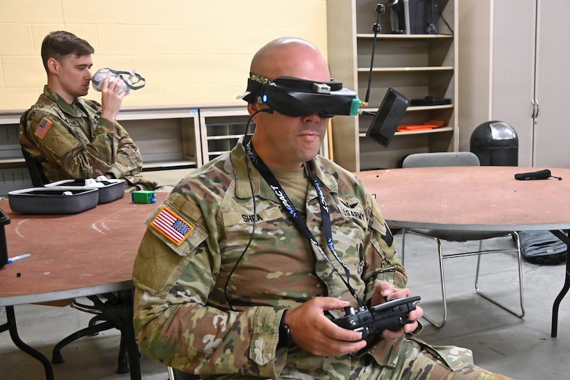 Chief Warrant Officer 2 Nathan Shea, the Unmanned Aircraft Systems operations officer at the Fort Indiantown Gap UAS facility, operates a first-person-view, or FPV, drone on Sept. 2, 2025, at Fort Indiantown Gap, Pennsylvania. (Pennsylvania National Guard photo by Brad Rhen)