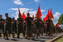 U.S. Marines and Sailors with Marine Aircraft Group (MAG) 24, 1st Marine Aircraft Wing, participate in a formation run at Marine Corps Base Hawaii, Nov 6. 2025. In celebration of the upcoming 250th Marine Corps Birthday, Marines and Sailors with MAG-24 ran 250 miles simultaneously with all 1st MAW units to strengthen unit cohesion and camaraderie. (U.S. Marine Corps photo by Cpl. Anabelle Reed-O’Brien)