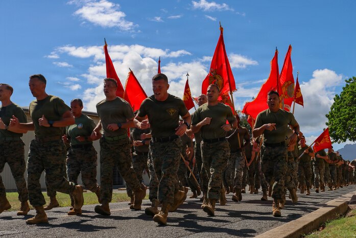 U.S. Marines and Sailors with Marine Aircraft Group (MAG) 24, 1st Marine Aircraft Wing, participate in a formation run at Marine Corps Base Hawaii, Nov 6. 2025. In celebration of the upcoming 250th Marine Corps Birthday, Marines and Sailors with MAG-24 ran 250 miles simultaneously with all 1st MAW units to strengthen unit cohesion and camaraderie. (U.S. Marine Corps photo by Cpl. Anabelle Reed-O’Brien)