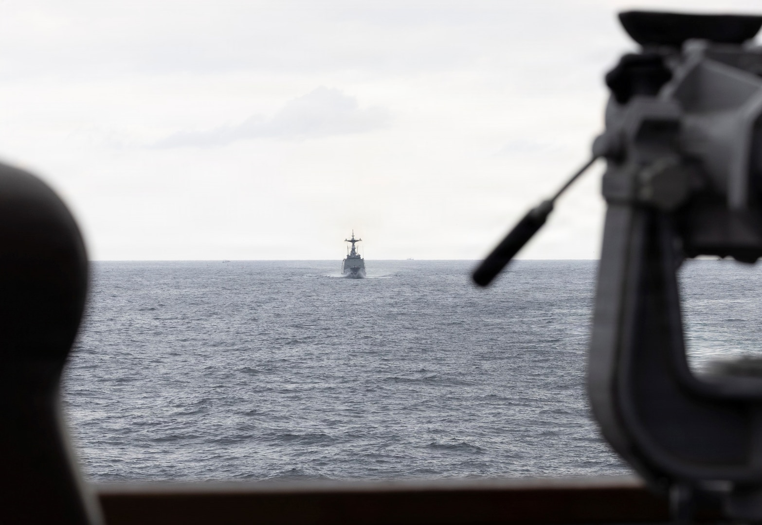 The Republic of Korea (ROK) Chungmugong Yi Sun-sin-class guided-missile destroyer ROKS Wang Geon (DDG 978) travels aft of Arleigh Burke-class guided-missile destroyer USS Dewey (DDG 105) during the Maritime Counter Special Operations Exercise (MCSOFEX) with the ROK Navy Nov. 18, 2025.