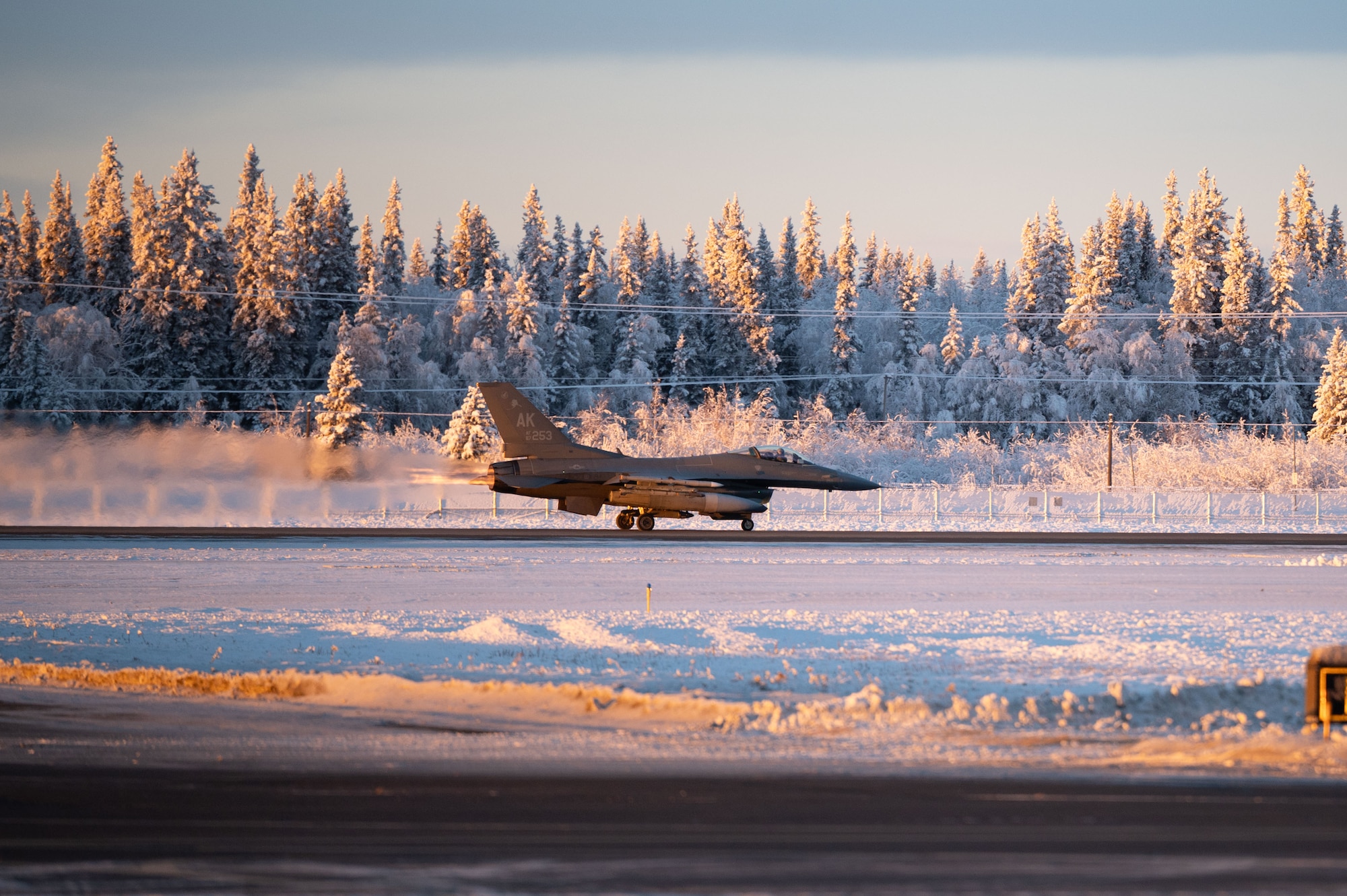 A U.S. Air Force F-16 Fighting Falcon assigned to the 18th Fighter Interceptor Squadron begins to take off at Eielson Air Force Base, Alaska, Nov. 18, 2025.