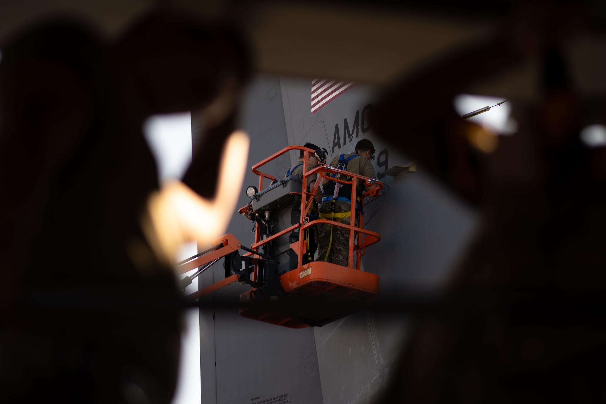 U.S. Air Force hydraulic technicians assigned to the 6th Maintenance Squadron repannel a KC-135 Stratotanker following an inspection at MacDill Air Force Base, Florida, Oct. 29, 2025. Periodic inspections provide personnel with an in-depth understanding of the aircraft allowing for more accurate and effective maintenance. (U.S. Air Force photo by Senior Airman Zachary Foster)