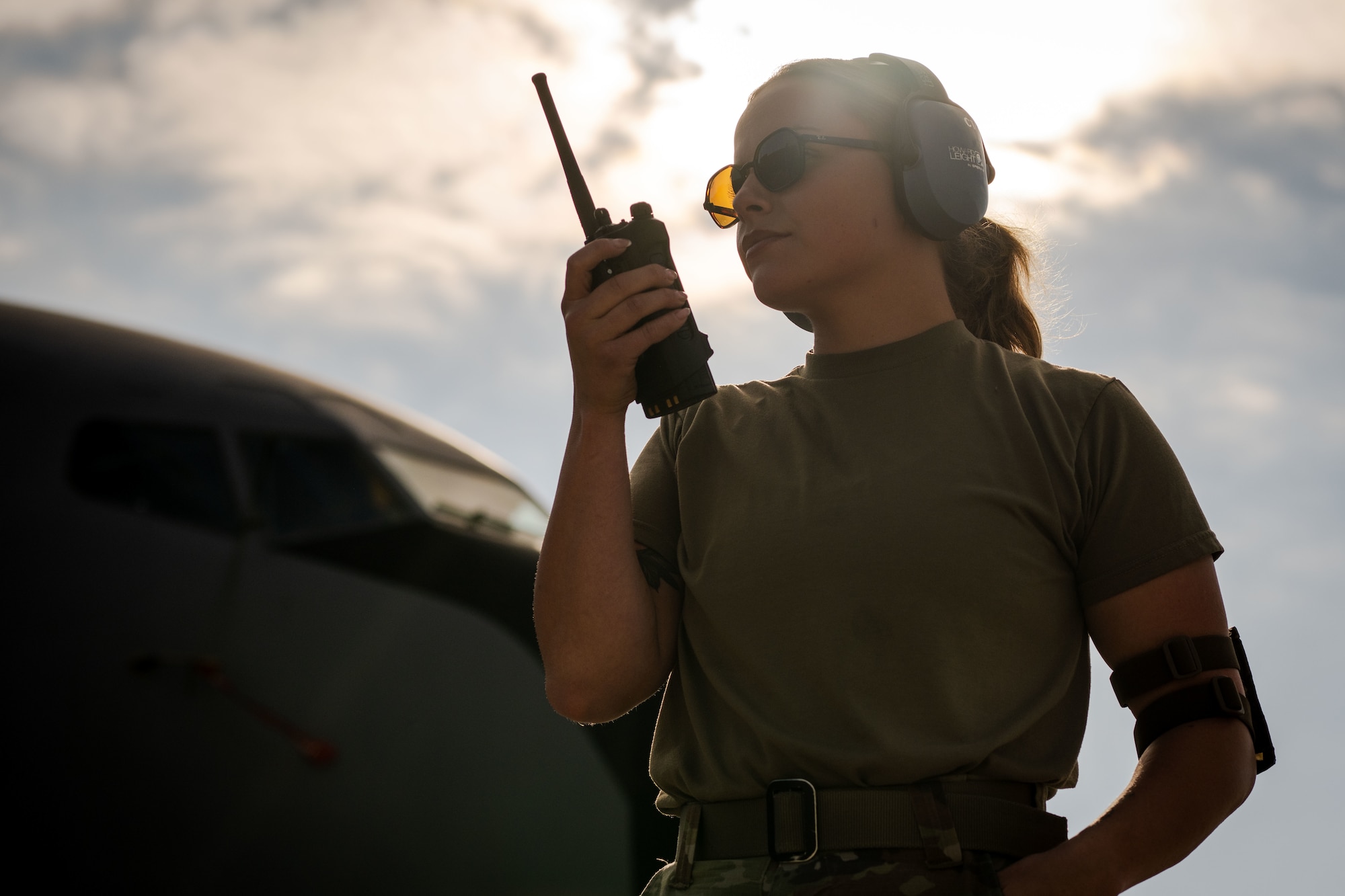 U.S. Air Force Staff Sgt. Madeline Johnson, 6th Logistics Readiness Squadron petroleum, oils and lubricants (POL) specialist utilizes a hand-held radio at MacDill Air Force Base, Florida, Oct. 29, 2025. POL personnel work in lockstep with aircraft maintenance specialists and flight planners to ensure the wing is ready to meet the nation’s air refueling requirements at a moment’s notice. (U.S. Air Force photo by Senior Airman Zachary Foster)