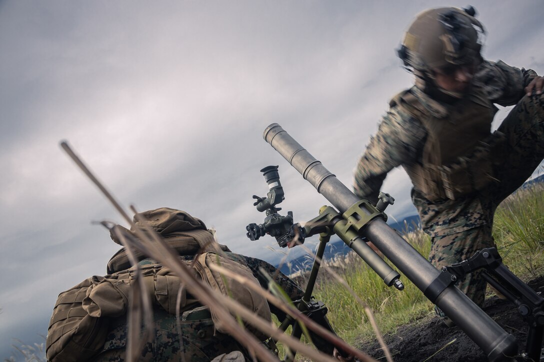 U.S. Marine Corps Lance Cpl. Andrew Nannie, a mortarman with Animal Company, Battalion Landing Team 1st Battalion, 7th Marine Regiment, 31st Marine Expeditionary Unit, fires an M224 60mm mortar system during live-fire training at Combined Arms Training Center, Camp Fuji, Japan, Sept. 30, 2025. Marines conducted combined arms live-fire training to maintain operational readiness, tactical proficiency, and enhance lethality while operating within the first island chain. The 31st MEU, the Marine Corps’ only continuously forward-deployed MEU, provides a flexible and lethal force ready to perform a wide range of military operations as the premiere crisis response force in the Indo-Pacific region. (U.S. Marine Corps photo by Lance Cpl. Victor Gurrola)