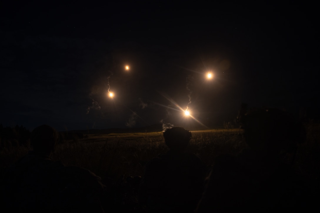 U.S. Marines with Battalion Landing Team 1st Battalion, 7th Marine Regiment, 31st Marine Expeditionary Unit, fire 60mm illumination mortar rounds during live-fire training at Combined Arms Training Center, Camp Fuji, Japan, Sept. 30, 2025. Marines conducted combined arms live-fire training to maintain operational readiness, tactical proficiency, and enhance lethality while operating within the first island chain. The 31st MEU, the Marine Corps’ only continuously forward-deployed MEU, provides a flexible and lethal force ready to perform a wide range of military operations as the premiere crisis response force in the Indo-Pacific region. (U.S. Marine Corps photo by Lance Cpl. Victor Gurrola)
