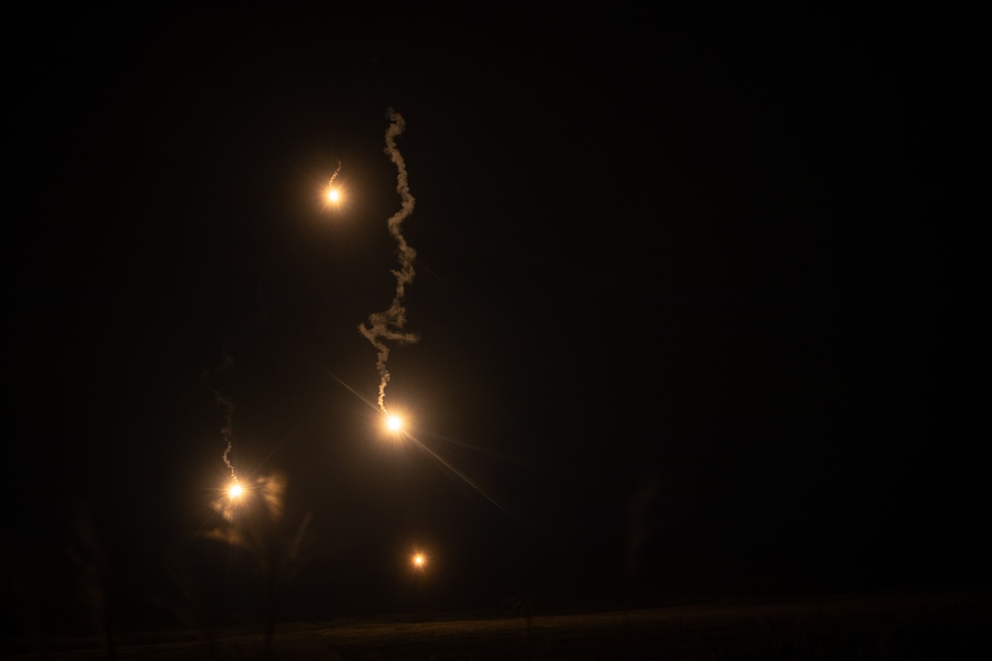 U.S. Marines with Battalion Landing Team 1st Battalion, 7th Marine Regiment, 31st Marine Expeditionary Unit, fire 60mm illumination mortar rounds during live-fire training at Combined Arms Training Center, Camp Fuji, Japan, Sept. 30, 2025. Marines conducted combined arms live-fire training to maintain operational readiness, tactical proficiency, and enhance lethality while operating within the first island chain. The 31st MEU, the Marine Corps’ only continuously forward-deployed MEU, provides a flexible and lethal force ready to perform a wide range of military operations as the premiere crisis response force in the Indo-Pacific region. (U.S. Marine Corps photo by Lance Cpl. Victor Gurrola)