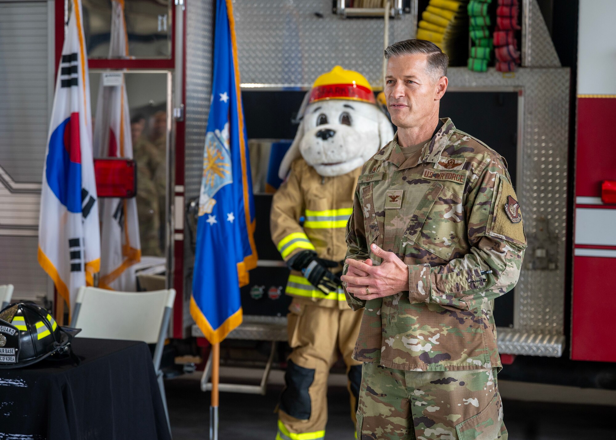 U.S. Air Force Col. Ryan Ley, 51st Fighter Wing commander, discusses the importance of Fire Prevention Week at Osan Air Base, Republic of Korea, Oct. 6, 2025. Fire Prevention Week is observed each year during the week of Oct. 9 in commemoration of the Great Chicago Fire of 1871.(U.S. Air Force photos by Staff Sgt. Sarah Williams)