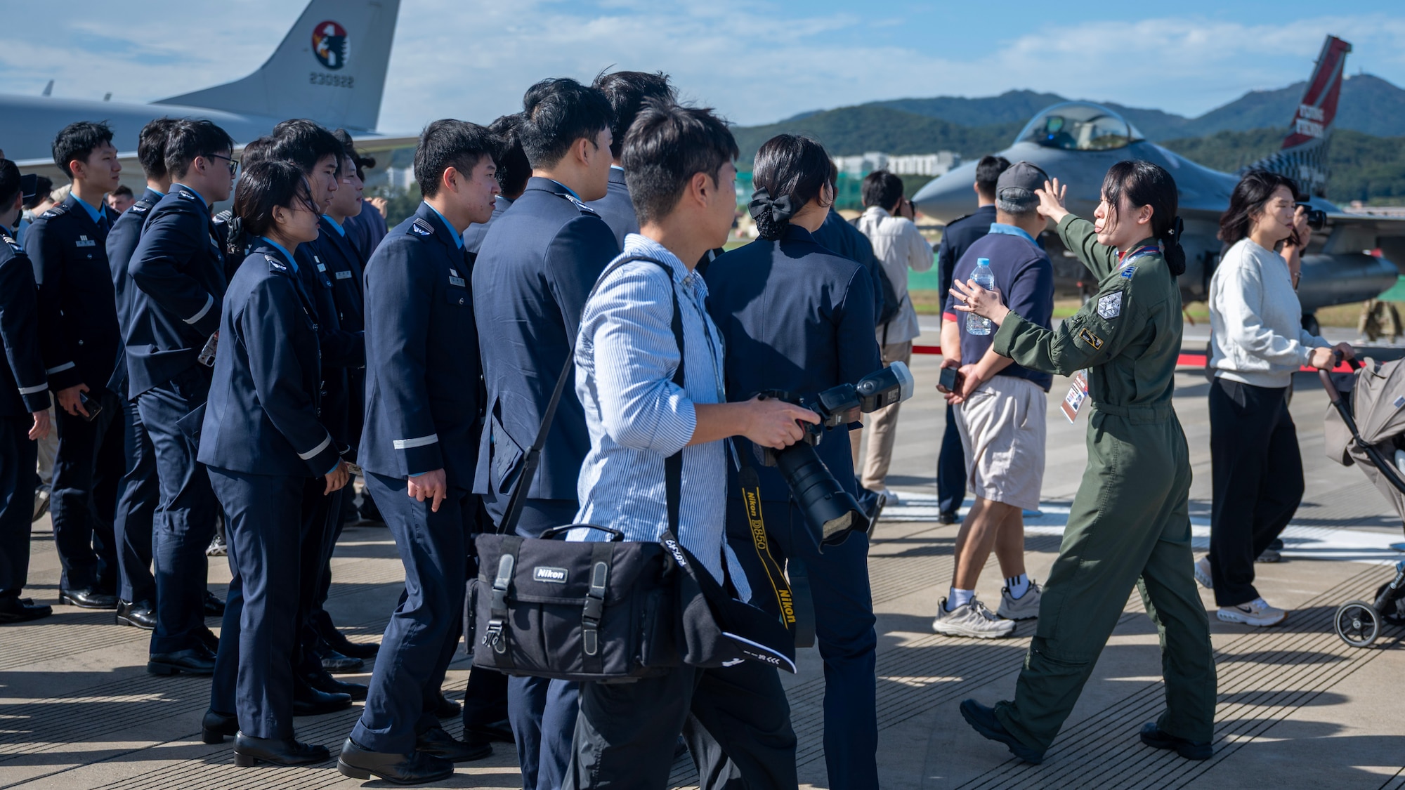 Republic of Korea air force cadets view a U.S. Air Force F-16 Fighting Falcon during the 2025 Seoul International Aerospace and Defense Exhibition at Seoul Air Base, ROK, Oct. 17, 2025. Seoul ADEX 25 is one of Northeast Asia’s largest and most comprehensive events, bringing together aviation experts, defense leaders, and enthusiasts from around the world. (U.S. Air Force photo by Staff Sgt. Sarah Williams)