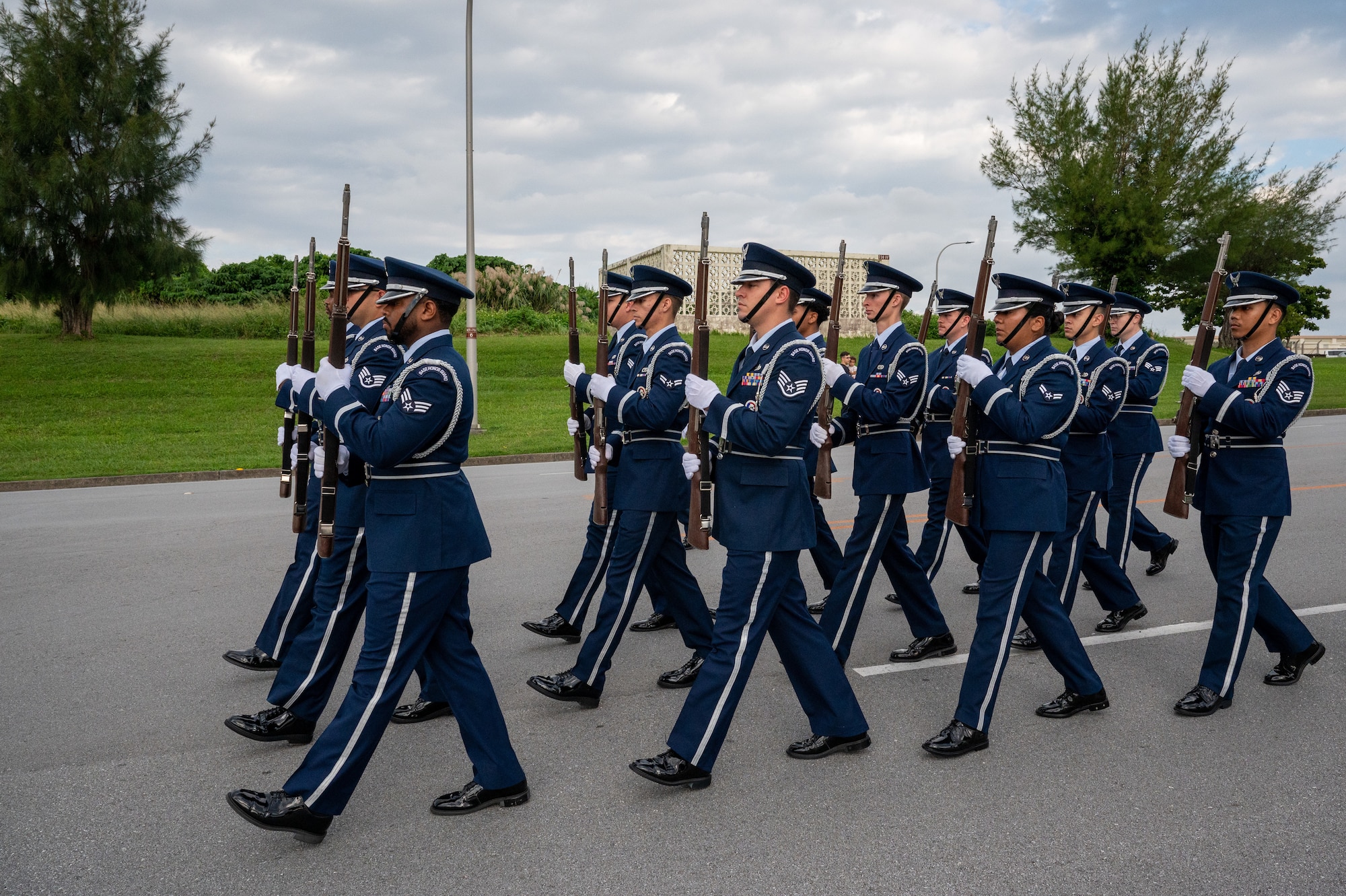 military members walk during a parade
