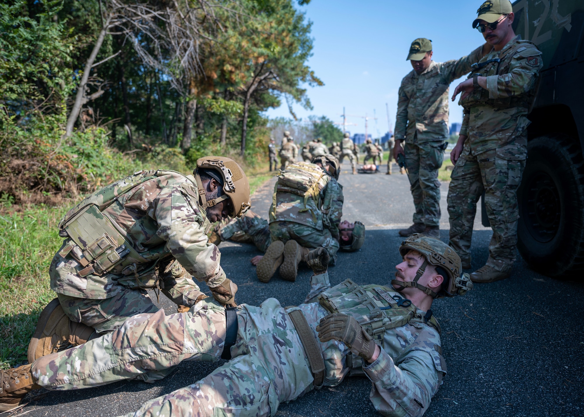 Members of the 51st Security Forces Squadron are timed on tactical combat casualty care during a Combat Readiness Course at Osan Air Base, Republic of Korea, Oct. 29, 2025. CRC strengthened Osan’s defense posture by ensuring Airmen can react quickly, communicate clearly, and operate confidently during crisis situations. (U.S. Air Force photo by Staff Sgt. Sarah Williams)