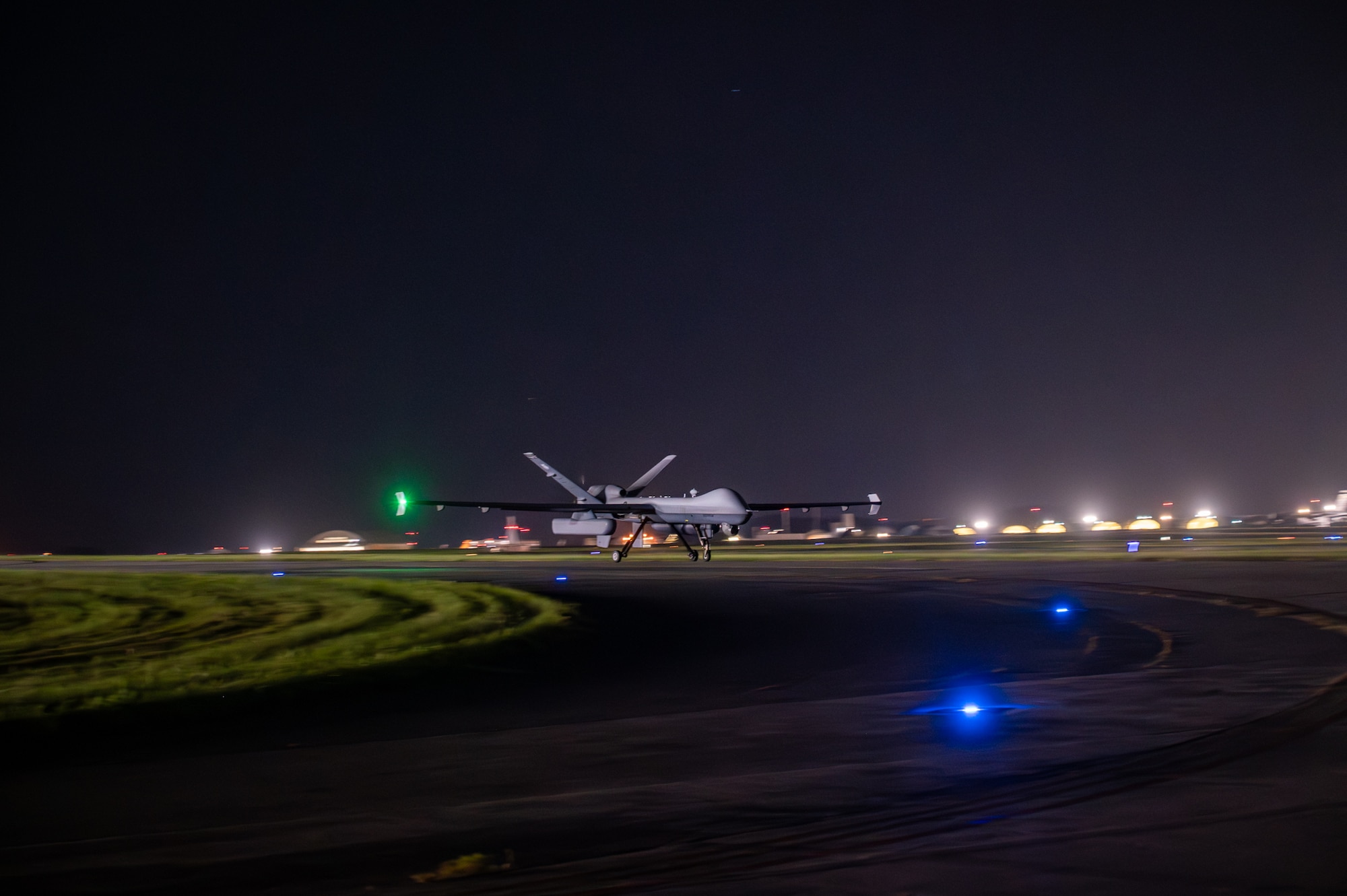 A U.S. Air Force MQ-9 Reaper assigned to the 319th Expeditionary Reconnaissance Squadron, takes off from taxiway lima during Project Lima Blazing Egress of Airfield Nonstandard, on Kadena Air Base, Japan, Oct. 9, 2025.