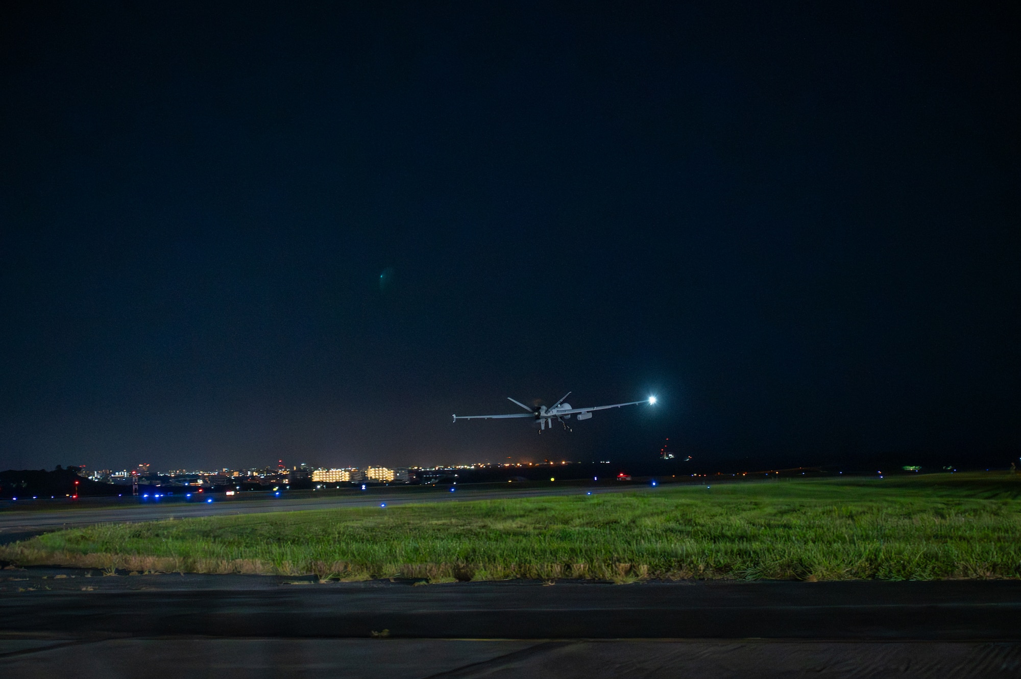 A U.S. Air Force MQ-9 Reaper assigned to the 319th Expeditionary Reconnaissance Squadron, takes off from taxiway lima during Project Lima Blazing Egress of Airfield Nonstandard, on Kadena Air Base, Japan, Oct 9, 2025.