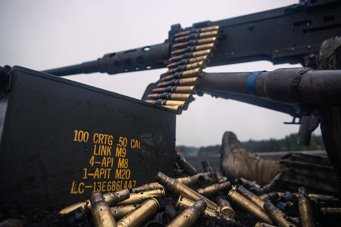 U.S. Marines with Weapons Company, Battalion Landing Team 1st Battalion, 7th Marine Regiment, 31st Marine Expeditionary Unit, fire an M2 Browning .50-caliber machine gun equipped with a heavy machine gun sighting system during live-fire training at Combined Arms Training Center, Camp Fuji, Japan, Oct. 1, 2025. Marines conducted combined arms live-fire training to maintain operational readiness, tactical proficiency, and enhance lethality while operating within the first island chain. The 31st MEU, the Marine Corps’ only continuously forward-deployed MEU, provides a flexible and lethal force ready to perform a wide range of military operations as the premiere crisis response force in the Indo-Pacific region. (U.S. Marine Corps photo by Lance Cpl. Victor Gurrola)