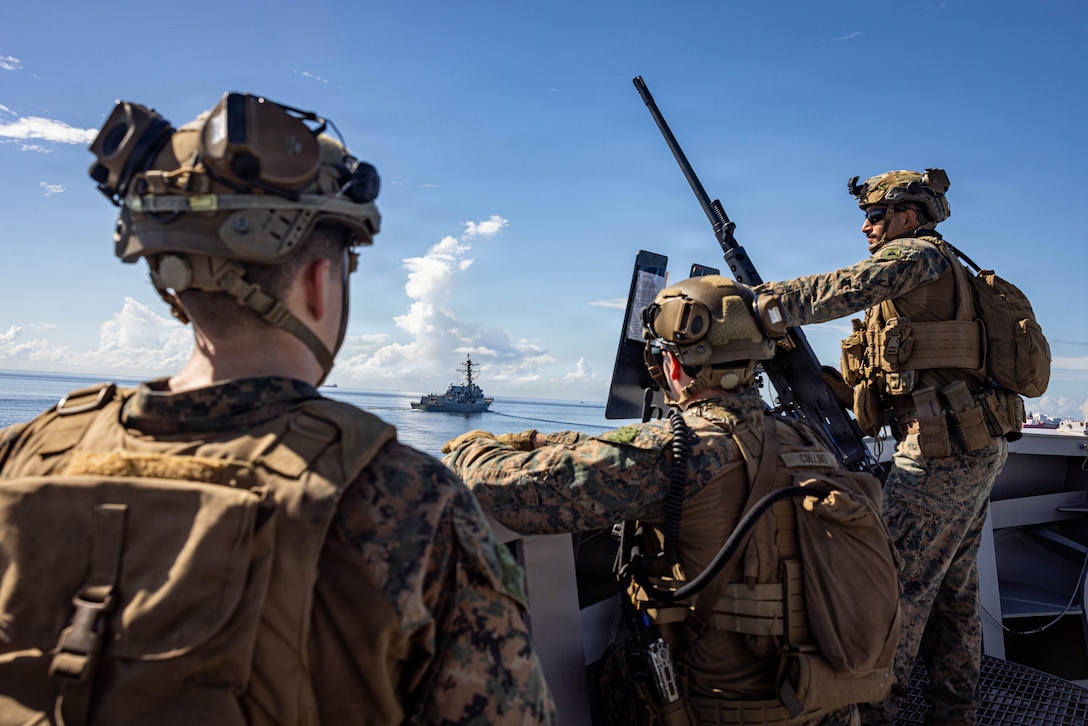 U.S. Marines with India Company, Battalion Landing Team 3/6, 22nd Marine Expeditionary Unit (Special Operations Capable), and Sailors with San Antonio-class amphibious transport dock USS Fort Lauderdale (LPD 28) and Arleigh Burke-class guided-missile destroyer USS Stockdale (DDG 106), conduct a strait transit while underway in the Caribbean Sea, Nov. 18, 2025. U.S. military forces are deployed to the Caribbean in support of the U.S. Southern Command mission, Department of War-directed operations, and the president's priorities to disrupt illicit drug trafficking and protect the homeland. (U.S. Marine Corps photo)