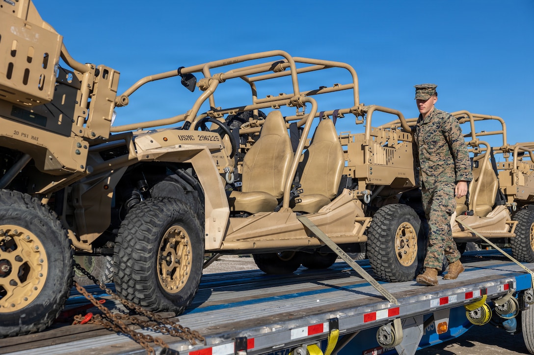 U.S. Marine Corps Lance Cpl. Landon Ginter, a light reconnaissance vehicle crewman with 2d Light Armored Reconnaissance Battalion, 2d Marine Division, conducts vehicle inspections on a Polaris MRZR at Marine Corps Base Camp Lejeune, Nov. 6, 2025. The Movement Control Team was created to properly receive and transport cargo and equipment throughout areas of operations. (U.S. Marine Corps photo by Lance Cpl. Payton Walley)