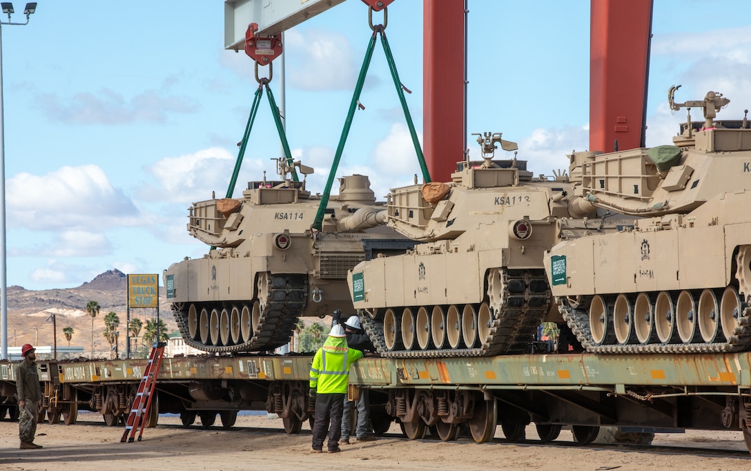 Vehicles and equipment assigned to the Royal Saudi Land Forces (RSLF) are loaded onto a train for shipping to the Kingdom of Saudi Arabia following completion of National Training Center Rotation 26-02 at Fort Irwin, Calif., Nov. 18, 2025. Partnering with U.S. Army Central and 3rd Security Forces Assistance Brigade, the RSLF integrated with 2nd Brigade, 1st Cavalry Division during their first-ever U.S. Army combat training center rotation to improve interoperability and operational effectiveness in a tough, realistic environment. (U.S. Army photo by Staff Sgt. Devon Jones)