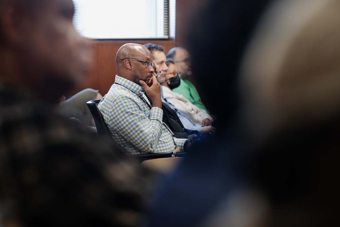 Federal employees attend a town hall meeting at Marine Corps Support Facility New Orleans, Nov. 20, 2025. The town hall meeting addressed improvements to civilian work life at Marine Corps Support Facility New Orleans and future operations within Marine Forces Reserve and Marine Forces South. (U.S. Marine Corps photo by Lance Cpl. Van Hoang)