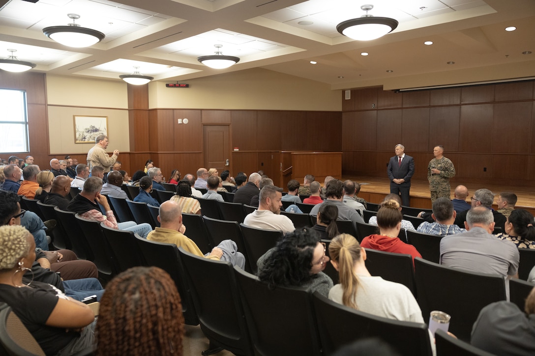 Federal employees with Marine Forces Reserve and Marine Forces South ask questions during a town hall meeting at Marine Corps Support Facility New Orleans, Nov. 20, 2025. The town hall meeting addressed improvements to civilian work life at Marine Corps Support Facility New Orleans and future operations within Marine Forces Reserve and Marine Forces South. (U.S. Marine Corps photo by Lance Cpl. Carlina Holland)