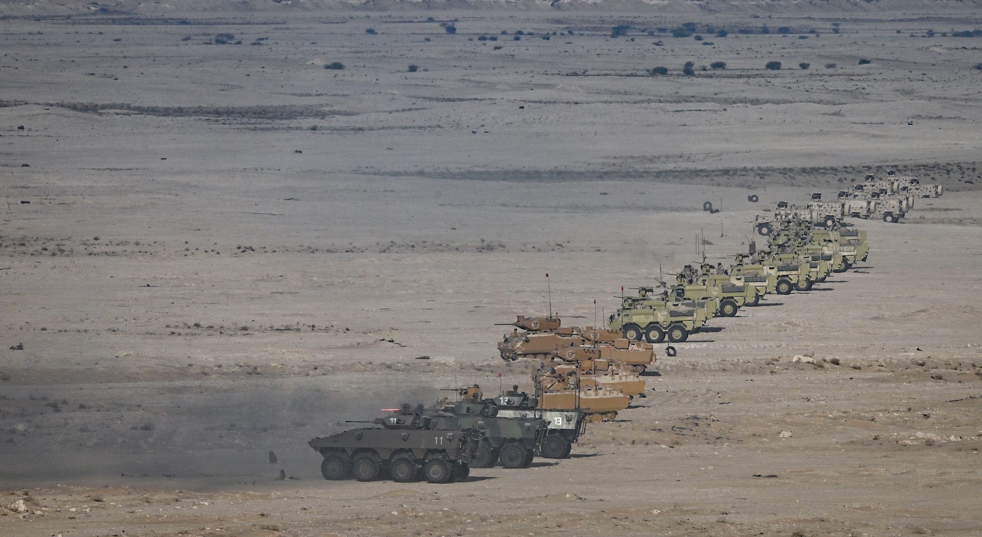 Military personnel from the U.S., Qatar, Italy, the United Kingdom, Turkey and France participate in the exercise Ferocious Falcon 6 live-fire demonstration within the U.S. Central Command area of responsibility, Nov. 20, 2025. Ferocious Falcon 6 is a biennial, Qatar-hosted multinational joint exercise designed to enhance lethality and combat efficiency among U.S. and allied forces. (U.S. Air Force photo by Senior Master Sgt. Richard P. Ebensberger)