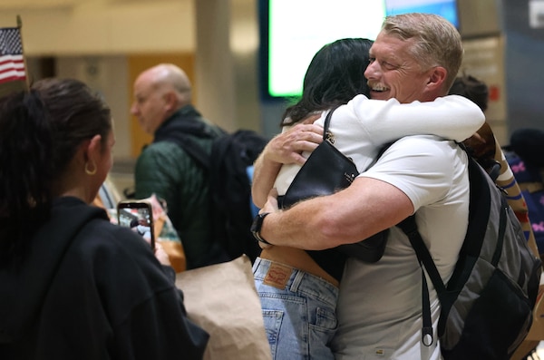 SAN DIEGO (Oct. 16, 2025) – Master Chief Hospital Corpsman Chad McFall, Navy Expeditionary Medical Unit 10 Gulf (EMU-10G) senior enlisted leader, embraces his daughter upon returning from a seven-month deployment. The EMU provided the greater Baghdad area with a Role 2 medical facility offering a full range of medical services, including surgery, trauma resuscitation, preventative medicine, mental health support, and a fully operational blood bank for U.S. Armed Forces, Department of War civilians, State Department personnel, Iraqi Security Forces, and other multinational coalition partners. (U.S. Navy photo by Arsenio R. Cortez Jr.)