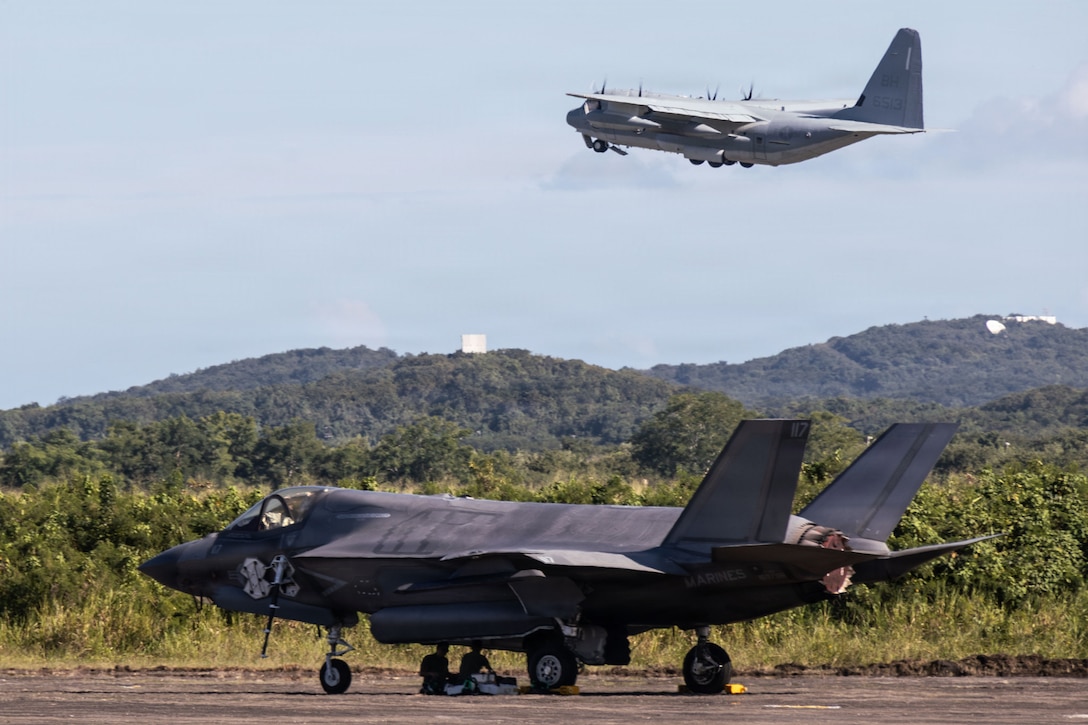 A U.S. Marine Corps KC-130J Hercules assigned to Marine Aerial Refueler Transport Squadron (VMGR) 252, Marine Aircraft Group 14, 2nd Marine Aircraft Wing, takes off while maintenance is conducted on a U.S. Marine Corps F-35B Lightning II assigned to Marine Fighter Attack Squadron (VMFA) 225, U.S. Marine Corps Forces, South, at Jose Aponte de la Torre Airport in Ceiba, Puerto Rico, Nov. 17, 2025. U.S. military forces are deployed to the Caribbean in support of the U.S. Southern Command mission, Department of War-directed operations, and the president’s priorities to disrupt illicit drug trafficking and protect the homeland. (U.S. Marine Corps photo)