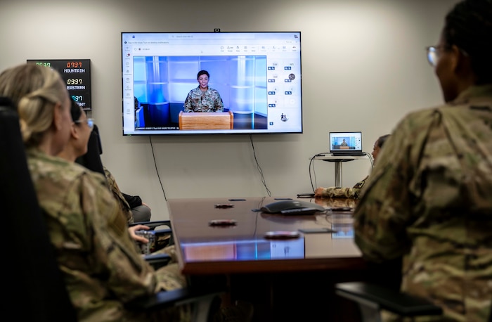 Barnes Center for Enlisted Education staff at Maxwell Air Force Base, Ala., watch the graduation of the virtual in-residence noncommissioned officer course from the Lankford Enlisted Professional Military Education Center, McGhee Tyson Air National Guard Base, Tenn., Nov. 19, 2025. The Barnes Center and Lankford shifted their enlisted professional military education courses from in-residence to virtual in-residence during the government shutdown to mitigate negative impacts to Airmen. (U.S. Air Force photo by Brian Ferguson)
