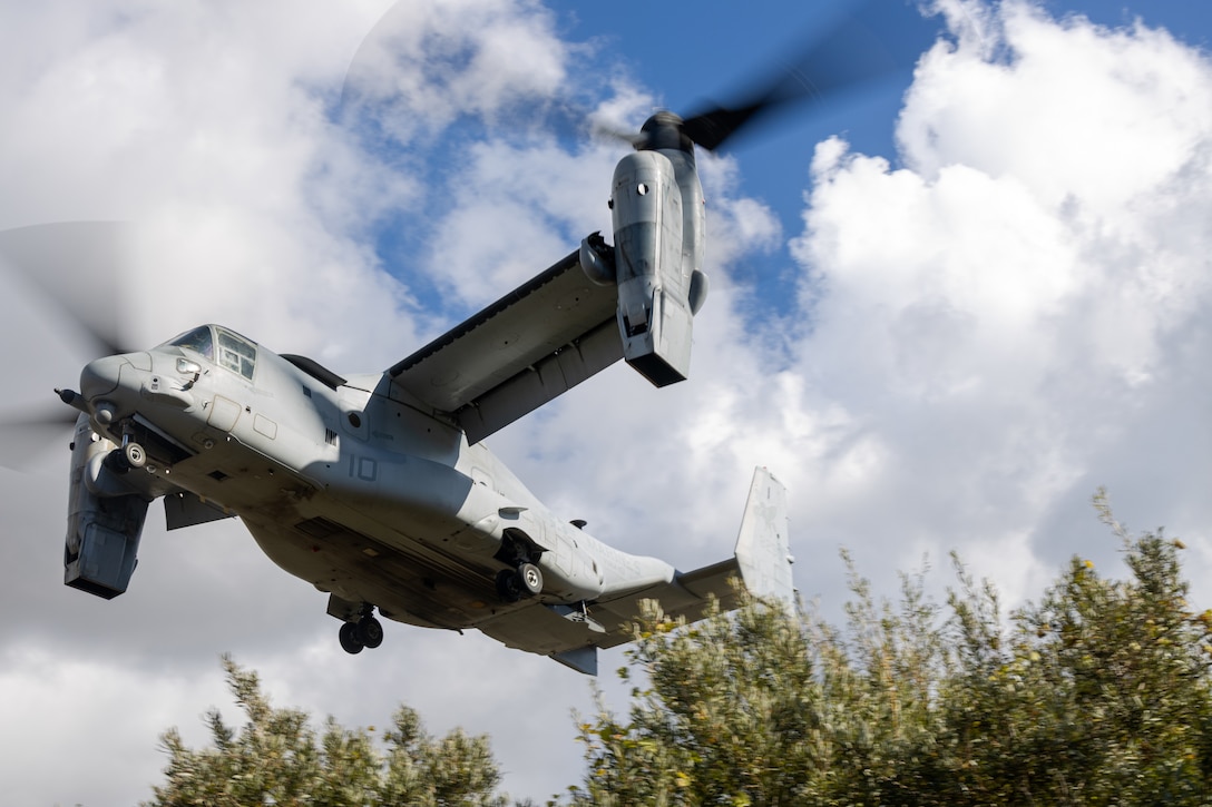 A U.S. Marine Corps MV-22B Osprey with Marine Medium Tiltrotor Squadron (VMM) 161, 3rd Marine Aircraft Wing, approaches a landing zone during a vertical assault course at Marine Corps Base Camp Pendleton, California, Nov. 19, 2025. Expeditionary Operations Training Group, I Marine Expeditionary Force, conducts vertical assault and raid training to develop advanced tactical skills and maintain readiness for future deployments. (U.S. Marine Corps photo by Cpl. Mary R. Jenni)