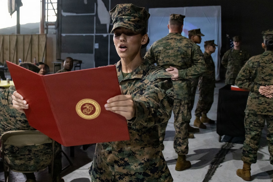 A U.S. Marine Corps adjutant with Marine Fighter Attack Squadron (VMFA) 225, U.S. Marine Corps Forces, South, reads Gen. John A. Lejeune’s Marine Corps Birthday Message during the Marine Corps’ 250th birthday ceremony at Jose Aponte de la Torre Airport in Ceiba, Puerto Rico, Nov. 14, 2025. U.S. military forces are deployed to the Caribbean in support of the U.S. Southern Command mission, Department of War-directed operations, and the president’s priorities to disrupt illicit drug trafficking and protect the homeland. (U.S. Marine Corps photo)