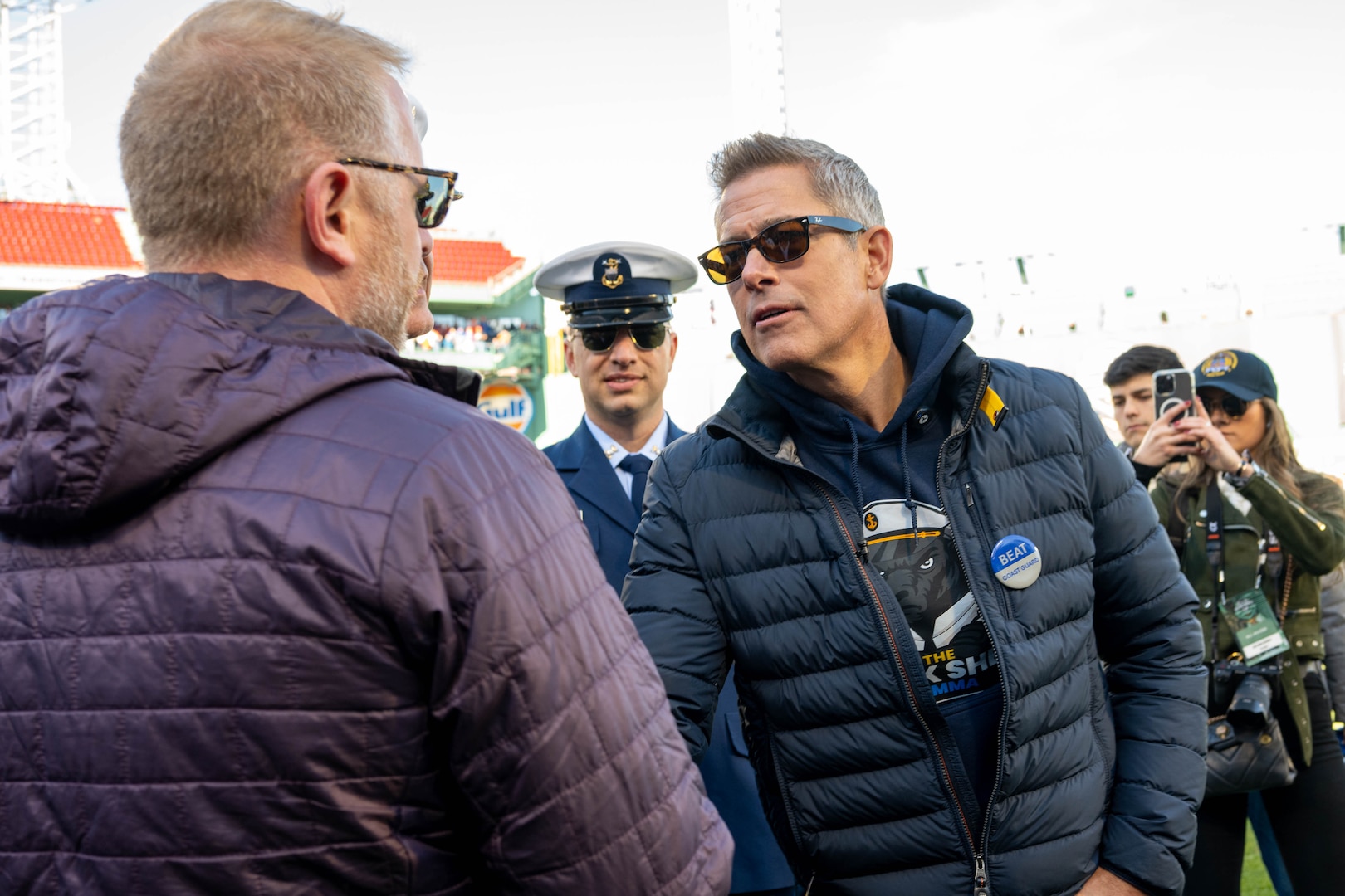 Senior Advisor to the Secretary for the Coast Guard Sean Plankey (left) shakes hands with the Secretary of Transportation Sean P. Duffy (right) during the 54th’ Secretaries’ Cup game at Fenway Park, Boston, Nov. 15, 2025. In 2003, “Secretary’s Cup” was pluralized when the U.S. Coast Guard moved to the Department of Homeland Security. (U.S. Coast Guard photo by Petty Officer Second Class Janessa Warschkow.)
