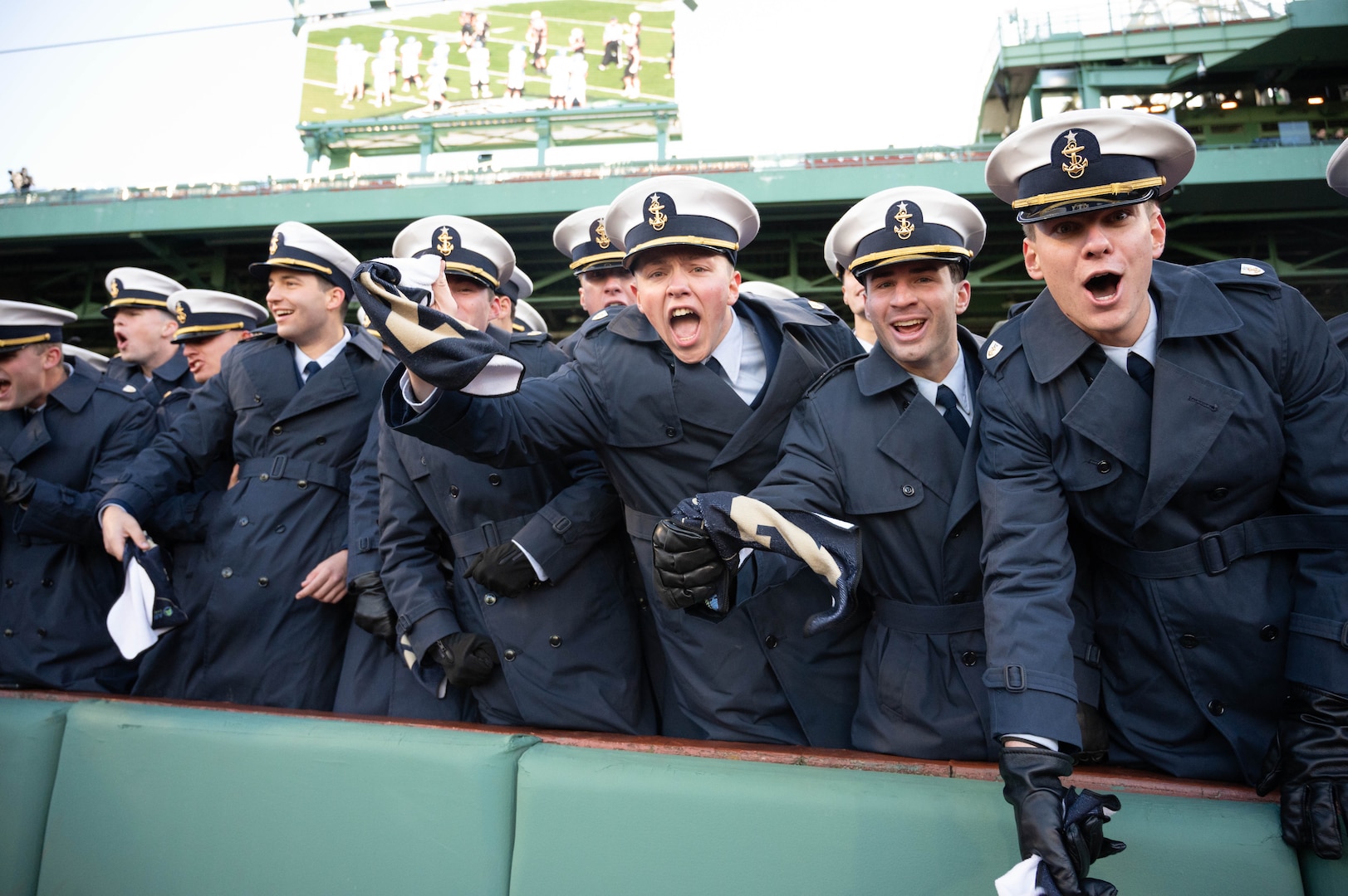 U.S. Coast Guard Academy football players cheer on their team from the stands at Fenway Park, Boston, Nov. 15, 2025. The location of the 54th Secretaries’ Cup is significant for being in a Major League stadium in the heart of New England, the birthplace of the U.S. Coast Guard. (U.S. Coast Guard photo by Petty Officer Third Class Leo Avila.)