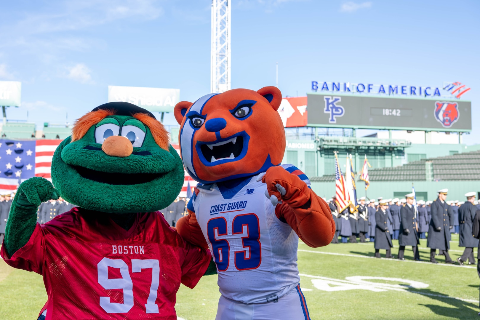 U.S Coast Guard Academy (USCGA)mascot Objee (right) and Redsox's mascot Wally the Green Monster, pose for a photo on the football field at Fenway Park, Boston, Nov. 15, 2025. The location of the 54th Secretaries’ Cup is significant for being in a Major League stadium in the heart of New England, the birthplace of the U.S. Coast Guard. (U.S. Coast Guard photo by Petty Officer Second Class Janessa Warshckow.)