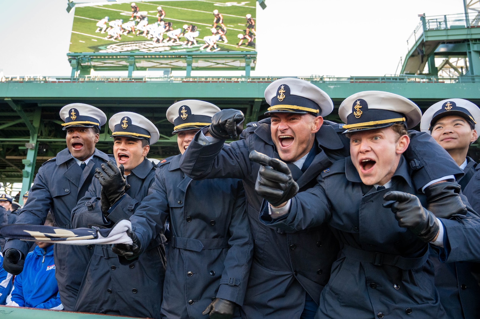 U.S. Coast Guard Academy (USCGA) cadets cheer during the 54th Secretaries’ Cup at Fenway Park, Boston, Nov. 15, 2025. In 2003, “Secretary’s Cup” was pluralized when the U.S. Coast Guard moved to the Department of Homeland Security. (U.S. Coast Guard photo by Petty Officer Third Class Leo Avila.)
