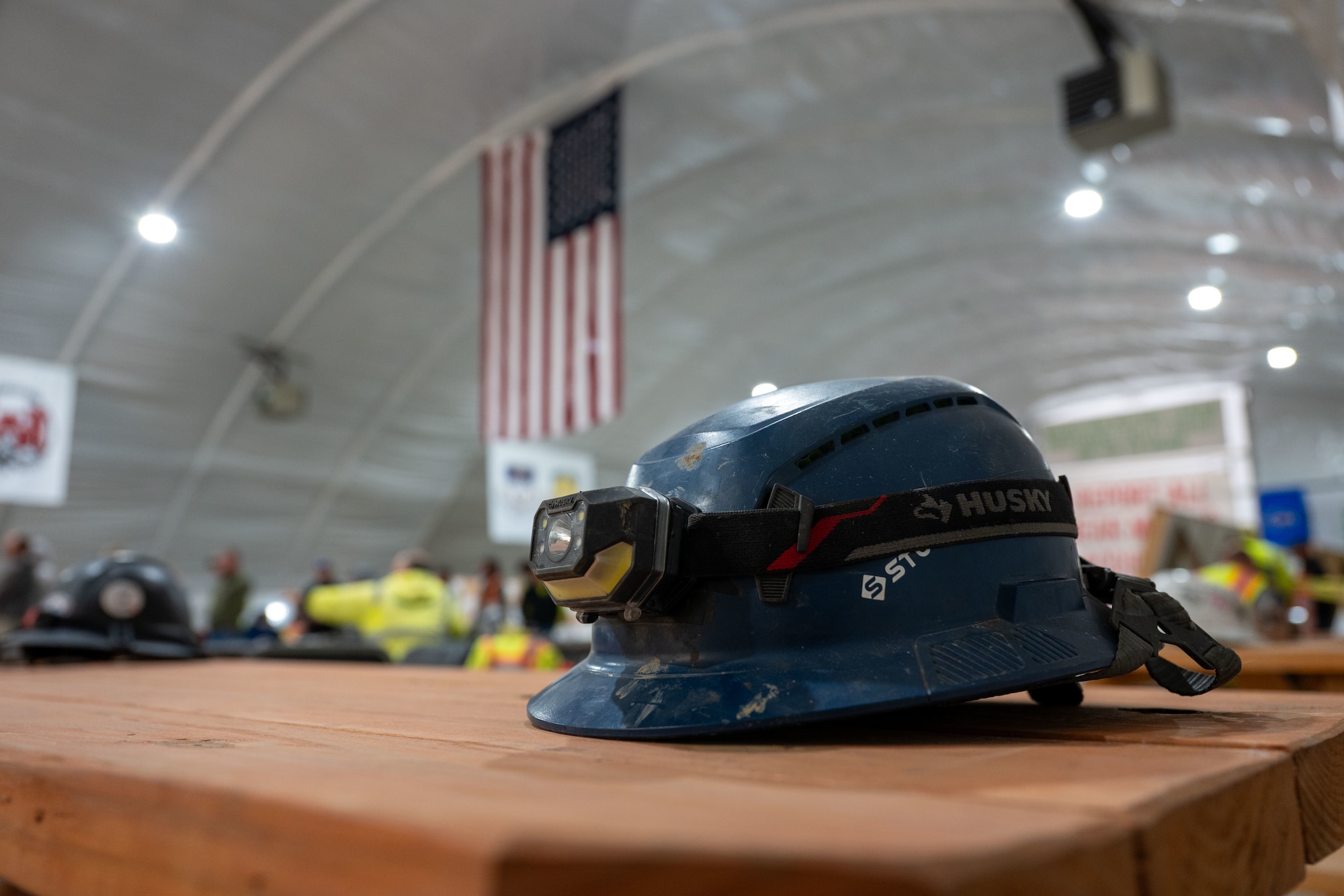 A hard hat rests on a table