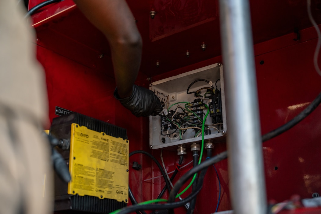 Hand turns screwdriver.