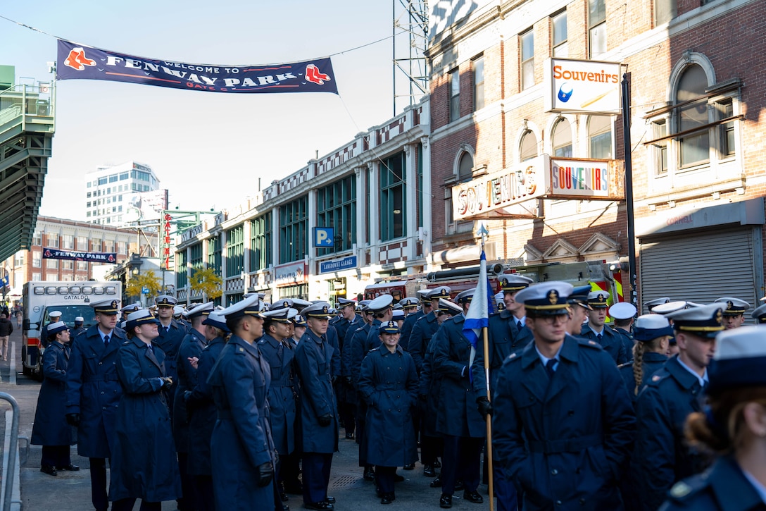 U.S. Coast Guard Academy (USCGA) cadets prepare to walk onto the field during the 54th Secretaries’ Cup at Fenway Park, Boston, Nov. 15, 2025. This is the first time USCGA and the U.S. Merchant Marine Academy have played outside of their home fields for a Secretaries’ Cup game. (U.S. Coast Guard photo by Petty Officer Second Class Janessa Warshckow.)