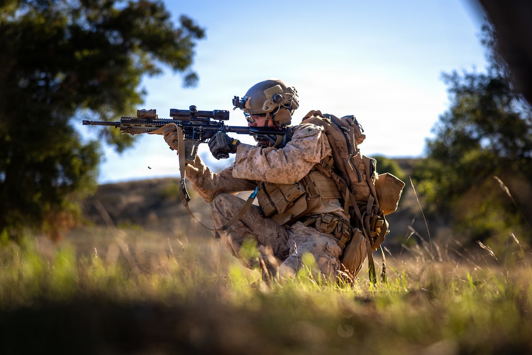 A U.S. Marine with Kilo Company, Battalion Landing Team 3/5, 11th Marine Expeditionary Unit, fires an M27 infantry automatic rifle during a live-fire battle drill as part of MEU Exercise 26.1 on Marine Corps Base Camp Pendleton, California, Oct. 30, 2025. During MEUEX, BLT 3/5 conducted company-level training, live-fire ranges and battle drills, employing various weapon systems to maintain mission readiness. (U.S. Marine Corps photo by Sgt. Trent A. Henry)