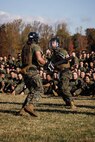 U.S. Marines with The Basic School, Training Command, compete in a weapons free-sparring event during a field meet at Marine Corps Base Quantico, Virginia, Oct. 31, 2025.  During the field meet, Marines with TBS participated in physical training and competitions to build camaraderie and celebrate the Marine Corps' 250th Birthday. (U.S. Marine Corps photo by Cpl. Joshua Barker)