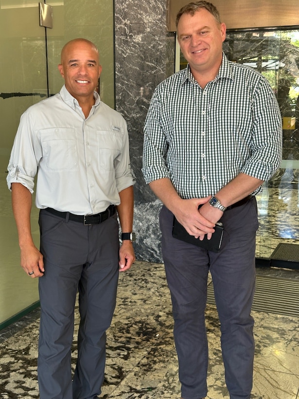 RDML Bresnihan (left) is greeted by Australian Defense Force Brigadier Mark Baldock outside the Northern Territory Defence Office.