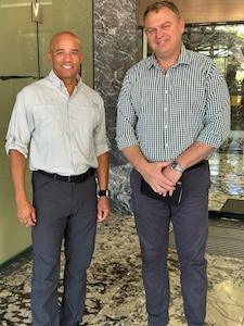 RDML Bresnihan (left) is greeted by Australian Defense Force Brigadier Mark Baldock outside the Northern Territory Defence Office.